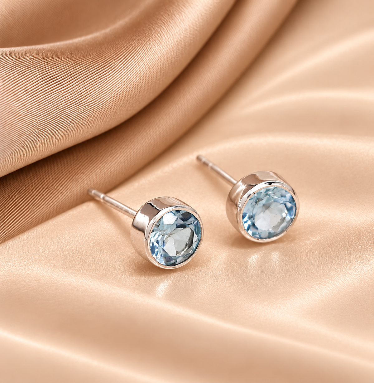 Sterling Silver Blue Topaz Stud Earrings