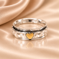 Sterling Silver & Gold Heart Spinner Ring – Hammered Design