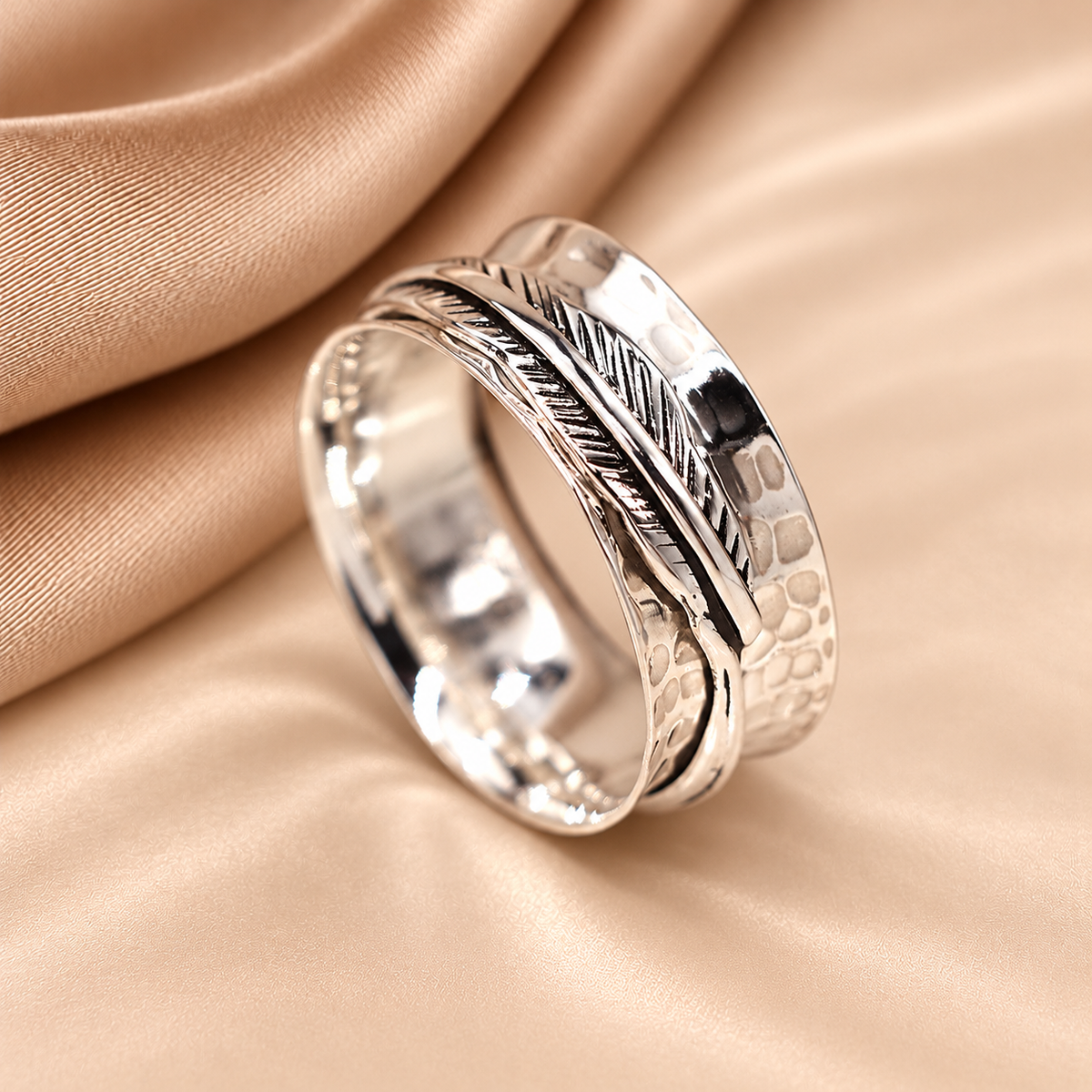 Sterling Silver Feather Spinner Ring – Hammered Boho Design